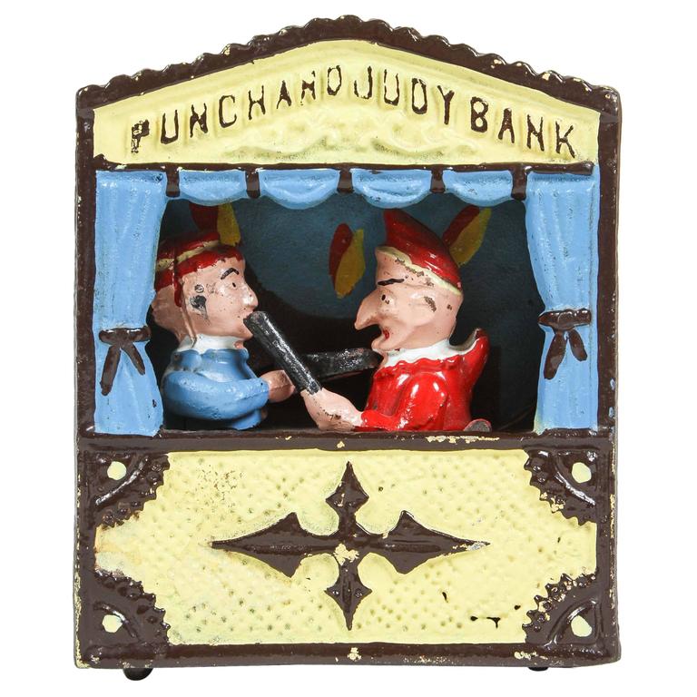 Punch outlets and Judy Antique Castiron Coinbank